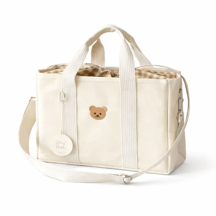 Aion nappy bag handbag in white with bear motif appliqué, front view