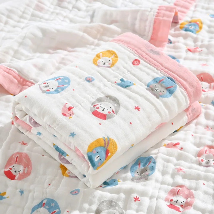 Folded rabbit print wrap with pink bound border