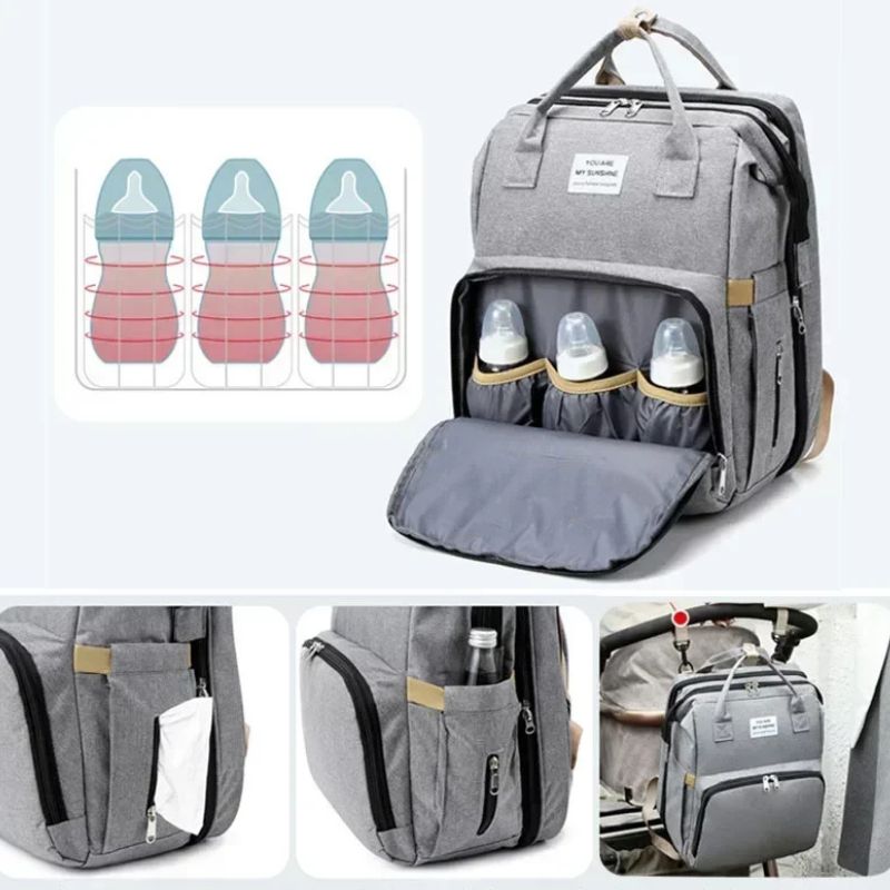 Bottle storage compartment inside the nappy bag backpack