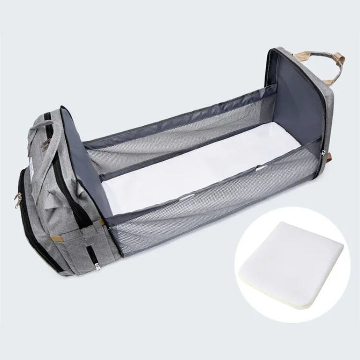 Detachable wipeable changing mat included with the nappy bag backpack