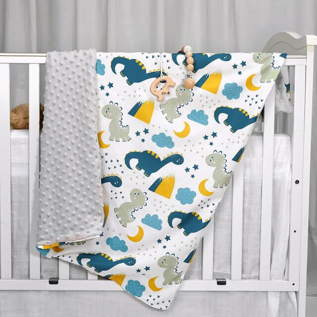 Dinosaur gawky cot quilt